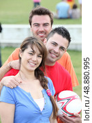 Mixed football team. Стоковое фото, агентство Ingram Publishing / Фотобанк Лори