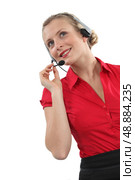 Peppy woman wearing a headset. Стоковое фото, агентство Ingram Publishing / Фотобанк Лори