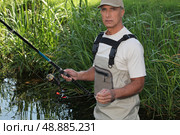 Man fishing. Стоковое фото, агентство Ingram Publishing / Фотобанк Лори