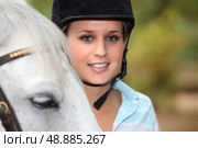 Blond female horse rider. Стоковое фото, агентство Ingram Publishing / Фотобанк Лори