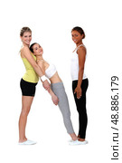 women doing fitness with a female coach. Стоковое фото, агентство Ingram Publishing / Фотобанк Лори
