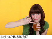 a woman eating jam. Стоковое фото, агентство Ingram Publishing / Фотобанк Лори