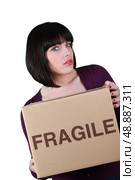 Unhappy woman on moving day. Стоковое фото, агентство Ingram Publishing / Фотобанк Лори