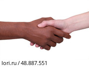 Metis person and white person shaking hands. Стоковое фото, агентство Ingram Publishing / Фотобанк Лори