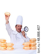 A cook with a loudhailer. Стоковое фото, агентство Ingram Publishing / Фотобанк Лори