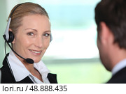 Interpreter smiling. Стоковое фото, агентство Ingram Publishing / Фотобанк Лори