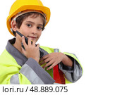 Young boy pretending to be a traffic guard. Стоковое фото, агентство Ingram Publishing / Фотобанк Лори