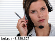 Secretary with headset. Стоковое фото, агентство Ingram Publishing / Фотобанк Лори