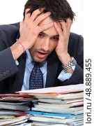Stressed young businessman. Стоковое фото, агентство Ingram Publishing / Фотобанк Лори
