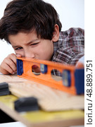 Carpenter Child. Стоковое фото, агентство Ingram Publishing / Фотобанк Лори