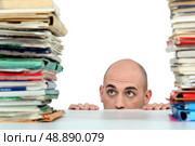 Man with piles of folders. Стоковое фото, агентство Ingram Publishing / Фотобанк Лори