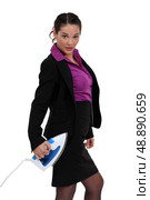Businesswoman stood with iron. Стоковое фото, агентство Ingram Publishing / Фотобанк Лори