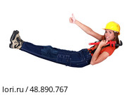 Female construction worker giving a thumbs up. Стоковое фото, агентство Ingram Publishing / Фотобанк Лори