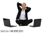 Blond businesswoman sat cross-legged. Стоковое фото, агентство Ingram Publishing / Фотобанк Лори