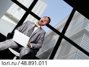 Businessman laughing hysterically. Стоковое фото, агентство Ingram Publishing / Фотобанк Лори