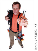 Electrician with specialist wire strippers. Стоковое фото, агентство Ingram Publishing / Фотобанк Лори