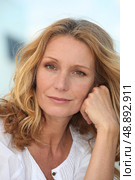 Portrait of a middle-aged blonde woman. Стоковое фото, агентство Ingram Publishing / Фотобанк Лори