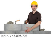 Construction worker at work. Стоковое фото, агентство Ingram Publishing / Фотобанк Лори