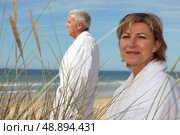 Couple wearing bathrobes. Стоковое фото, агентство Ingram Publishing / Фотобанк Лори