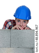 A terrified tradeswoman. Стоковое фото, агентство Ingram Publishing / Фотобанк Лори