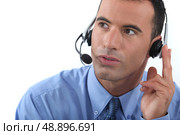 Man wearing a headset. Стоковое фото, агентство Ingram Publishing / Фотобанк Лори