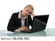 A bored secretary. Стоковое фото, агентство Ingram Publishing / Фотобанк Лори