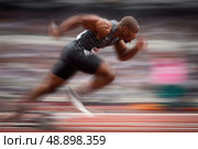 A man running on a track with a blurred background. Стоковое AI-изображение, AI-художник Ярославский Максим / Фотобанк Лори