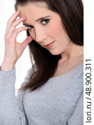 Brunette with a headache. Стоковое фото, агентство Ingram Publishing / Фотобанк Лори