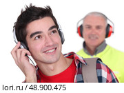 Young man’s earmuffs"" Стоковое фото, агентство Ingram Publishing / Фотобанк Лори