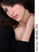 Woman with neck pain. Стоковое фото, агентство Ingram Publishing / Фотобанк Лори
