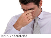 Businessman with a headache. Стоковое фото, агентство Ingram Publishing / Фотобанк Лори