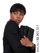 Nervous businesswoman has something to hide. Стоковое фото, агентство Ingram Publishing / Фотобанк Лори