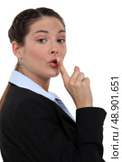 A businesswoman shushing. Стоковое фото, агентство Ingram Publishing / Фотобанк Лори