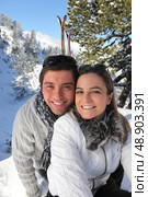 Portrait of a couple skiing in the Alps. Стоковое фото, агентство Ingram Publishing / Фотобанк Лори