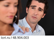 man trying to reconcile with girlfriend. Стоковое фото, агентство Ingram Publishing / Фотобанк Лори