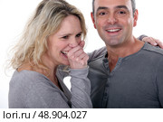 Loving couple in grey. Стоковое фото, агентство Ingram Publishing / Фотобанк Лори