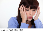 Woman suffering from cold. Стоковое фото, агентство Ingram Publishing / Фотобанк Лори