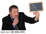 Man with hand slate. Стоковое фото, агентство Ingram Publishing / Фотобанк Лори