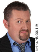 Disdainful businessman raising an eyebrow. Стоковое фото, агентство Ingram Publishing / Фотобанк Лори