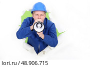 Worker with a megaphone. Стоковое фото, агентство Ingram Publishing / Фотобанк Лори