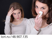 Sisters having argument. Стоковое фото, агентство Ingram Publishing / Фотобанк Лори