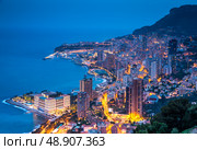 Monaco, Monte-Carlo, 05 april 2016: Monte-Carlo aerial view, night lights, night city, port Hercule, Prince Palace of Monaco, mountain, skyscrapers, mediterranean sea. Стоковое фото, фотограф Vladimir Drozdin / Фотобанк Лори