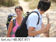 Hiking with a partner. Стоковое фото, агентство Ingram Publishing / Фотобанк Лори