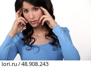 Woman with headache. Стоковое фото, агентство Ingram Publishing / Фотобанк Лори