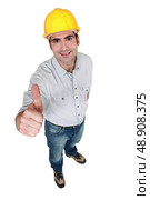 Construction worker giving the thumb’s up. Стоковое фото, агентство Ingram Publishing / Фотобанк Лори