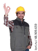 portrait of foreman making okay sign. Стоковое фото, агентство Ingram Publishing / Фотобанк Лори