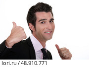 Businessman giving the thumbs up. Стоковое фото, агентство Ingram Publishing / Фотобанк Лори