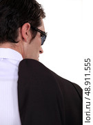 Mobster carrying his jacket. Стоковое фото, агентство Ingram Publishing / Фотобанк Лори