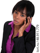 Businesswoman making a call. Стоковое фото, агентство Ingram Publishing / Фотобанк Лори