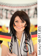 Woman supporting Germany. Стоковое фото, агентство Ingram Publishing / Фотобанк Лори